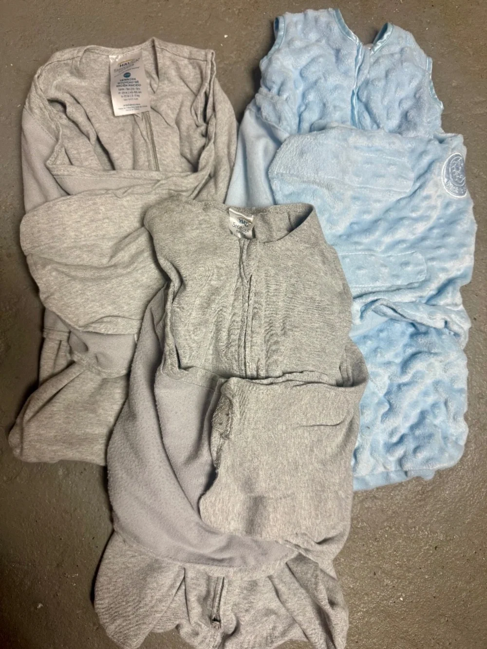 3 newborn Halo sleep sacks